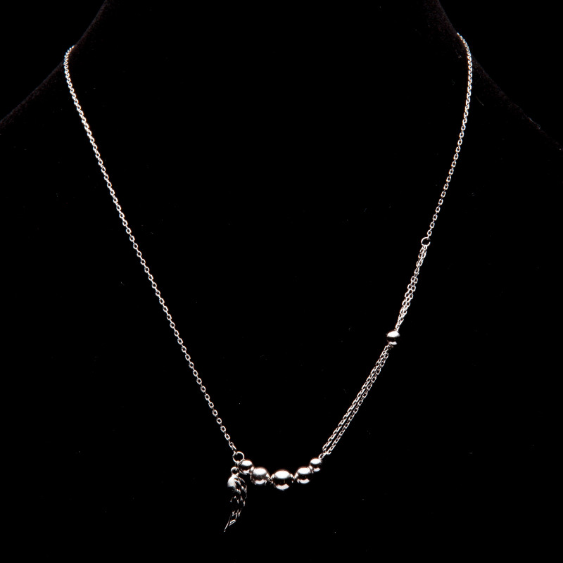 Srebrny naszyjnik skrzydło z kulkami