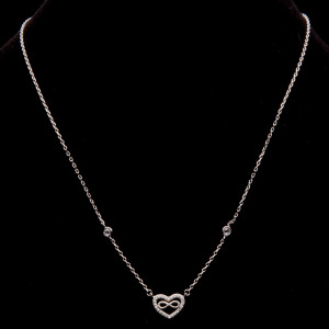 Srebrny naszyjnik serce z cyrkoniami z symbolem nieskończoności