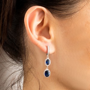 Srebrne kolczyki wiszące niebieskie cyrkonie