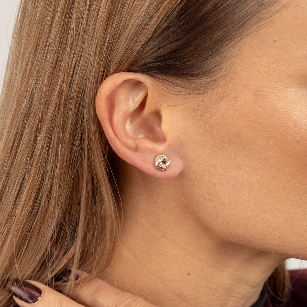 złote-dwukolorowe-kolczyki-585-supełki-sztyft